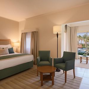 Superior Triple Queen or Twin Bed Garden view